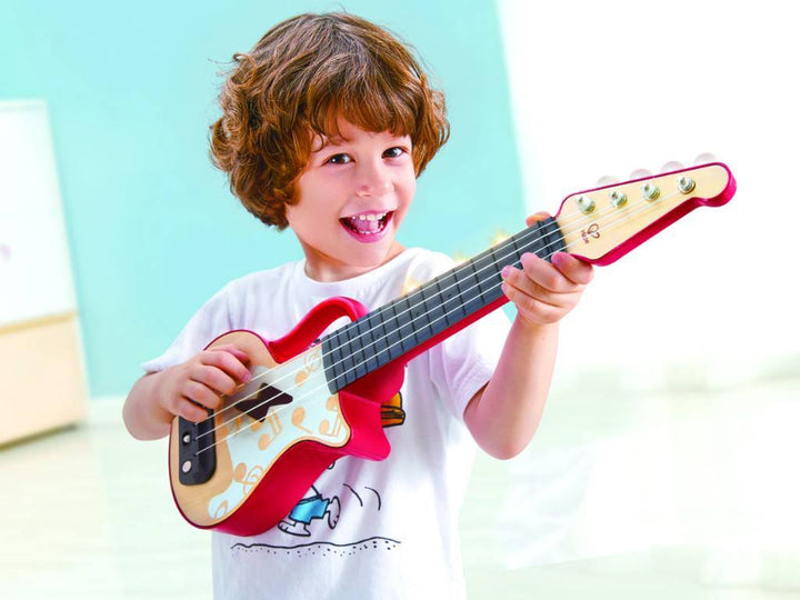 Aprende Ukelele con luces · Hape - Bizcocho de Yogur