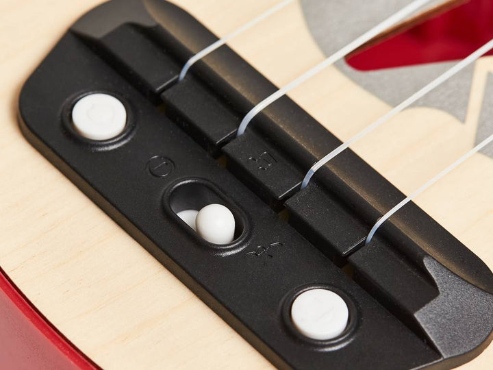 Aprende Ukelele con luces · Hape - Bizcocho de Yogur