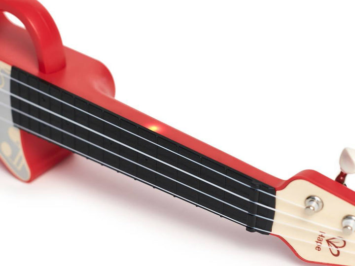 Aprende Ukelele con luces · Hape - Bizcocho de Yogur